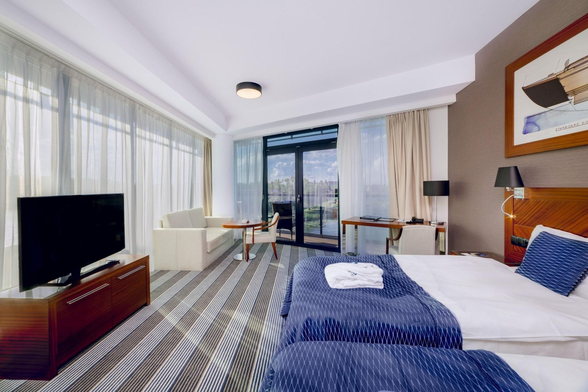 Hotel Mikolajki Leisure & Spa - Destigo Hotels Exterior foto A typical room at the hotel