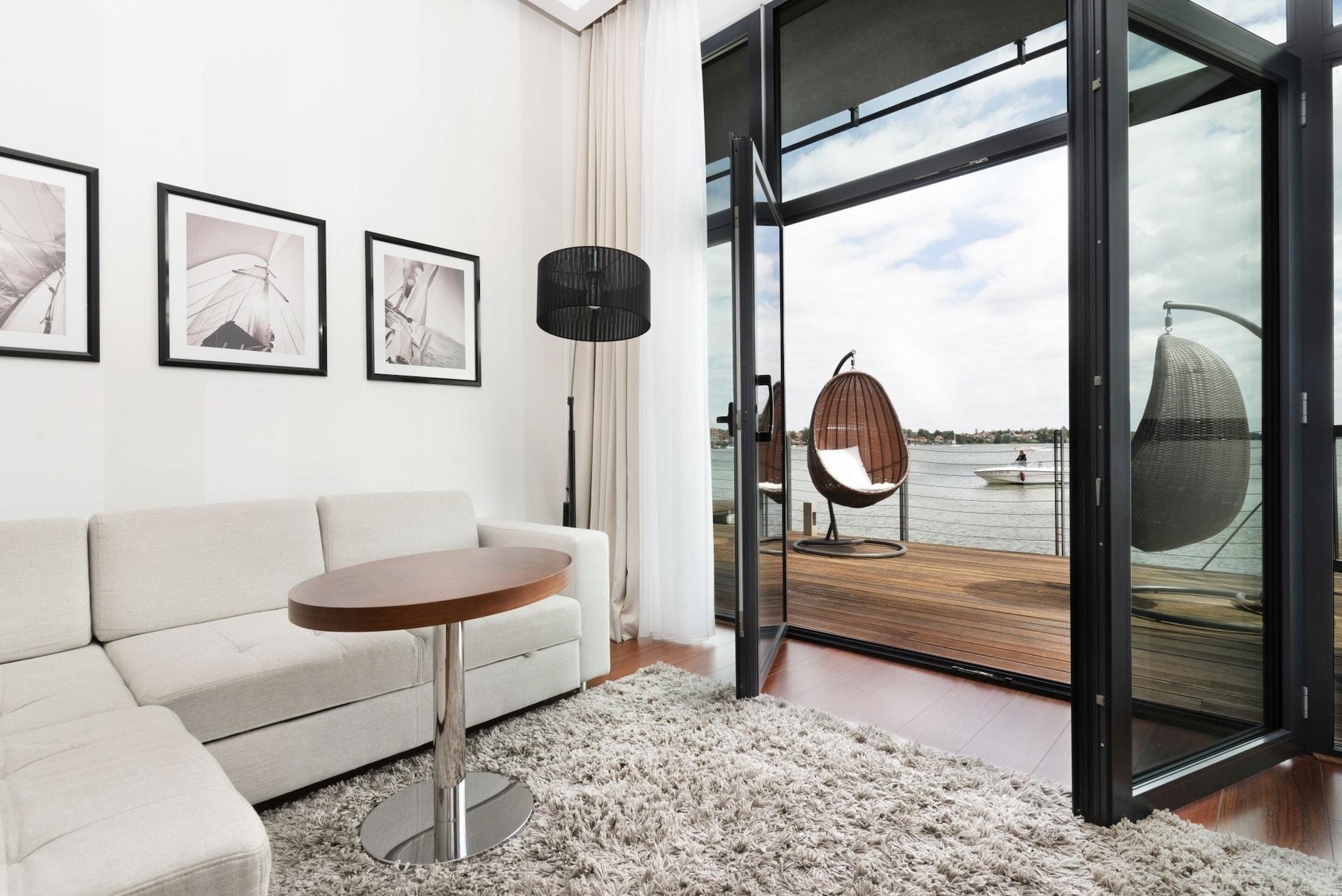 Hotel Mikolajki Leisure & Spa - Destigo Hotels Exterior foto A room with a view of the river